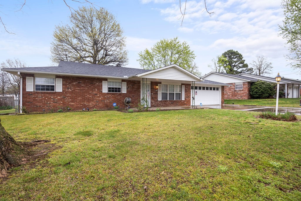 Charming & Spacious 1980s Classic with Room to Make It Your Own!
Well-maintained all-brick, 3-bedroom, 2-bath gem offering generous living space and endless potential. Conveniently located with quick access to I-49, Sunset Avenue, and Don Tyson Parkway, this home makes daily life a breeze.
Enjoy outdoor living year-round under the expansive covered patio—perfect for relaxing with a morning coffee or hosting weekend BBQs. The fully fenced backyard offers privacy, space to play, and even room to garden or add personal touches.
Love to stay active? You’re just a short stroll from the Randall Tyson Recreational Complex and Rotary Park, featuring playgrounds, a splash pad, baseball and soccer fields, tennis and basketball courts, walking trails, and a dog park for your furry friend.
Seller offering 1 year Home Warranty with Choice Home Warranty.
Recent updates include a new roof (2022) and water heater (2023), adding peace of mind.
Ring doorbell and security cameras convey for added convenience.
