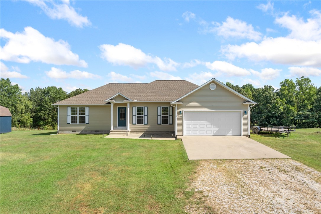 Enjoy the best of both worldsāconveniently close to town with the peace and privacy of the county. This meticulously maintained 2010 custom-built home features spacious rooms with tall ceilings, making each space feel bright and open. A split floor plan allows the primary suite to have some privacy. The large bedrooms all feature oversized or walk-in closets, providing ample storage space. Solid oak cabinets in the kitchen and plenty of counter space while you entertain guests. Window tinting has been professionally installed on south-facing windows to help reduce heat while still welcoming in plenty of natural light. Outside, youāll find an open yard with plenty of sunlightāperfect for a garden, play, or outdoor entertaining. This home is move-in ready, beautifully cared for, and it shows!