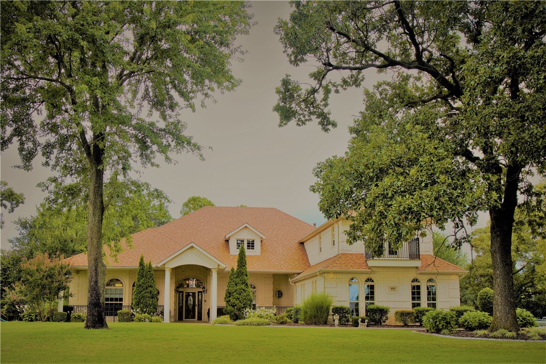 Mediterranean living on 2.16 ac. corner lot. Custom built-1 owner home. Includes 4382 SF/5BR/4.5BA/in-law suite, KIT open to family/living/formal DN. Huge dbl. bonus rm/half BA/tons of storage upstairs. Professional landscaping, fantastic backyard/in-ground heated pool/hot tub, grand outdoor kitchen, playground w/custom built treehouse, shop/well house w/30 watt amp for RV & well water for irrigation/pool. Gated property w/wrought iron fencing. Harber HS, convenient to Childrens hospital/I-49-112-412-71.