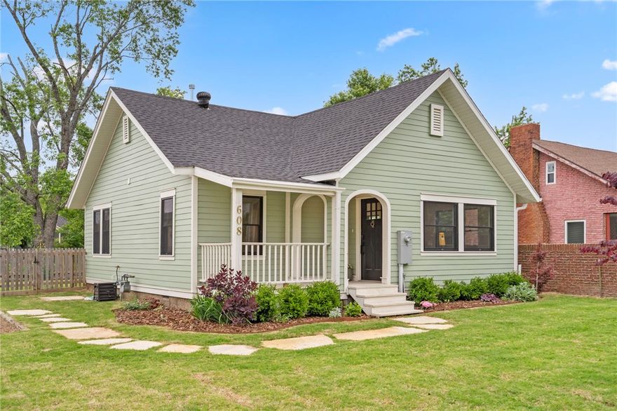 Welcome to the Bentonville Charmer. This 2-bed, 1-bath home has been completely renovated down to the studs—offering the peace of mind of all-new electrical, plumbing, and structural support brought fully up to code. Every inch of the interior has been thoughtfully redesigned with modern finishes, while preserving the vintage bedroom doors for a tasteful nod to the home’s history. Step inside to discover a bright, open layout with brand-new flooring, fixtures, appliances to convey, cabinetry, and more. Situated on a spacious corner lot with a fully fenced backyard, it offers both privacy and plenty of room for pets, gardening, or entertaining. The location? Unmatched. Just 900 feet to your morning coffee at Airship and 900 feet to the Razorback Greenway by Crystal Bridges Art Museum, half a mile to the Bentonville Square and one mile to the Walmart Home Office. It's the perfect blend of peace and proximity. Turnkey and move-in ready, this charmer won't last long.