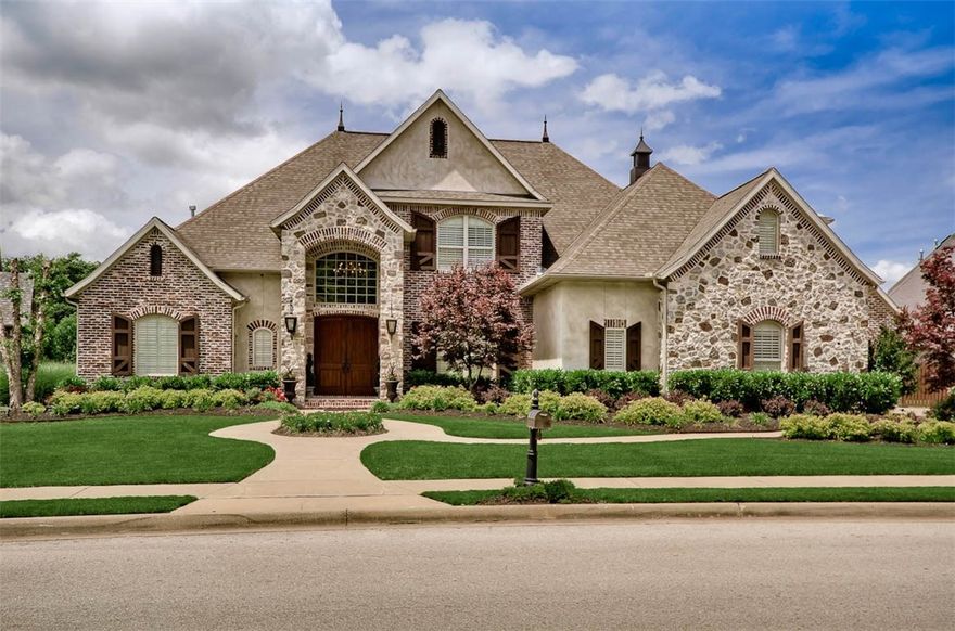 One of the most Elegant, Executive Style Golf Front Homes w/Spectacular Views in Shadow Valley & extensive resort-style veranda, outdoor kitchen on 1/2 acre lot -this home will Inspire & Wow you w/its Luxurious Amenities, Generously sized rooms & Enchanting details. Gourmet Chef's Kitchen features Wolf Appliances, gas range & double ovens w/adjacent warming drawer, built-in Beverage Cooler, Oversized Refrigerator & Impressive Island w/seating for 6. Custom designed, temperature controlled wine room is as