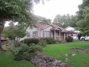 Large home w 3 bedrooms,3 baths,den,updated kitchen,LR on main level,lower level has great room w/dining,kitchen,den and more, w/separate entrance. Good opportunity for investment/rental or great home for your family! Hobby/workshop in the backyard w/gas and elec.Roof replaced '14,heat '10,air '11, Large attic w/flooring and sheet rock, covered deck,fenced yard,sq ftg per tax card, room sz approx.