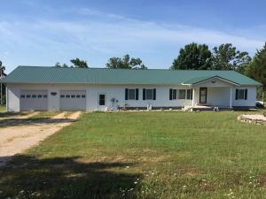 Very peaceful setting for this large 3 bedroom 2 bath home on 39.33 beautiful acres. Large rooms throughout, whirlpool tub in master, 30x12 covered deck that is connected to a pool in the back! Short drive to Bull Shoals Lake.