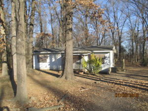 Vinyl sided 2 bedroom, 1 bath home on .62 of an acre.