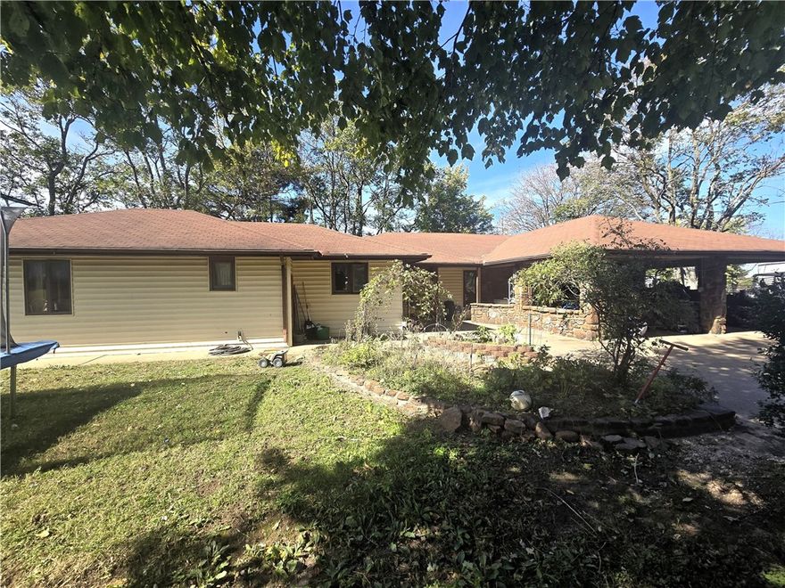 Check out this large, spacious 3-bedroom, 2362 SF home on 1.8 acres! This home features a beautiful kitchen with a large island, custom cabinets, built-in wall oven and a cooktop. There is also a 30x30 shop. Located just 20 minutes from the UofA and close to Prairie Grove schools and shopping.