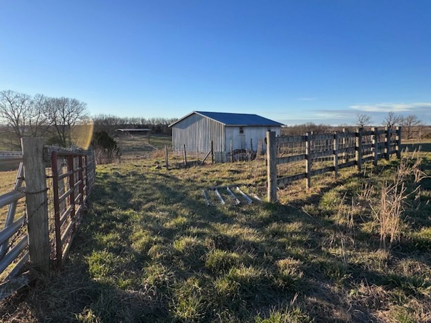 Beautiful 15+ acres of fenced pasture ready for livestock or your dream homestead. Property features two barns, a corral, and several outbuildings. This property offers everything you need for horses, cattle, or hobby farming. Buyers to verify all utilities.