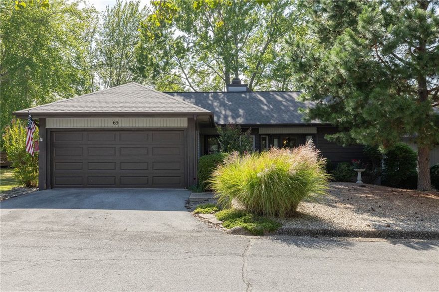 If low maintenance lifestyle and beautiful views are your thing you'll love this charming townhome overlooking the 8th Green of the Metfield course. Picture yourself enjoying the view across the golf course from the comfort of your living room or from the large deck out back. You'll love the natural beauty surrounding this thoughtfully designed and architecturally unique home, and you'll definitely enjoy having the POA maintain the yard and landscaping for a fully low maintenance life. Offering a fully enclosed 2 car garage, wood burning fireplace and many other unique features you won't find in most similar homes.  The 30 year architectural shingle roof was replaced just about 3 years ago, home offers upgraded insulation, hardwood cabinets and a convenient split floor plan layout that gives a great space for a guest room or home office. You've heard of the beautiful and active lifestyle Bella Vista has to offer, from paved trails, single track, golf, lakes, activity centers and so much more. Come see for yourself!