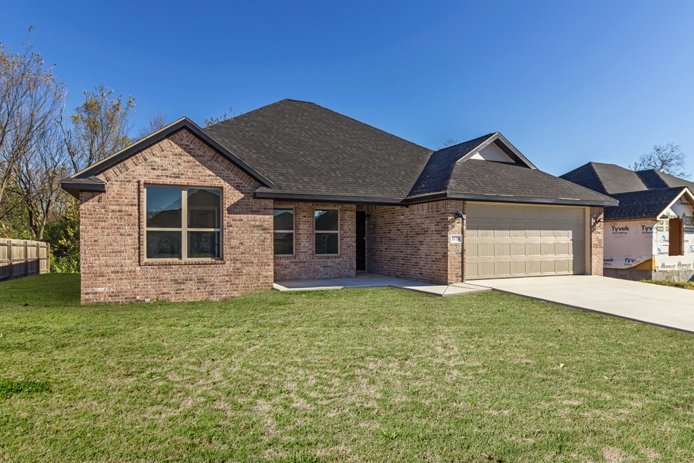 New Construction in Serenity S/D. Close to Don Tyson Pkwy, schools, and new park.
