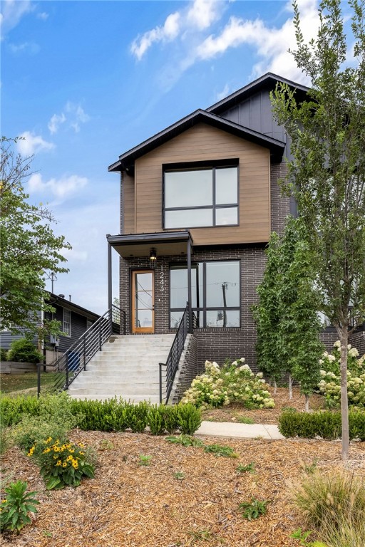 Welcome to this modern townhome located in the heart of Downtown Bentonville. Featuring 3 bedrooms and 2.5 bathrooms, this residence blends high-end modern design with comfort and functionality. Thoughtfully planned with both style and practicality in mind, the layout includes a designated office space, mudroom, and spacious 2-car garage—an exceptional amenity in the downtown area. Inside, you’ll find open living spaces, designer finishes, quartz counters, and abundant natural light throughout. Situated in close proximity to trails, Crystal Bridges Museum of American Art, and the Downtown Square, this property offers the best of walkable and bikeable Bentonville living.