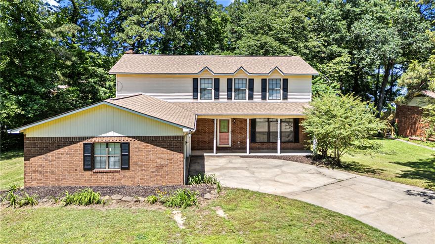Experience lakeside living at its best on the Russellville side of Lake Dardanelle. This beautiful home features a boat dock, sits on a dead end road, and has approximately 2,566 square feet of comfortable living space—ideal as a full-time residence or weekend getaway. Inside, you’ll find a spacious kitchen, two inviting living areas, four bedrooms, two and one-half bathrooms, a cozy fireplace, and a two-car garage. Step outside to a private back deck with peaceful lake views, perfect for relaxing or entertaining. Conveniently situated just off Marina Road, the property is only 8 minutes from downtown Russellville and 5 minutes from Interstate 40.