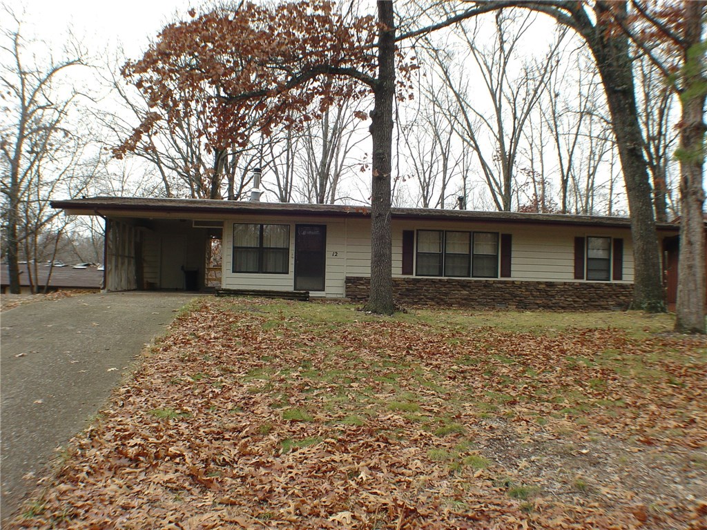Adorable two bedroom with all kitchen appliances. Pergo flooring throughout. Ceramic tile in kitchen and bath. Open concept with cute wood stove for cozy winter heat. Huge two tier deck for entertaining. Propane heat.