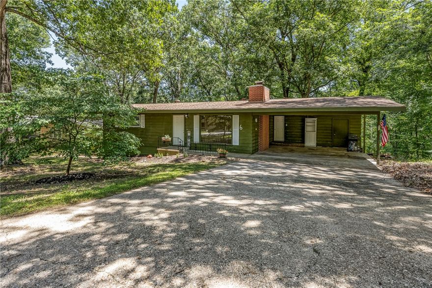 Ideal home for bike enthusiasts. Well manicured 2 bedroom 2 bath home surrounded by large trees and easy access to the trails. Minutes from Bella Vista Country Club and all amenities living in Bella Vista has to offer. Close to Hwy 71 but far enough away to avoid traffic noise, this gem is move in ready including a fence backyard for children and pets. Make an appointment today to see this charming home.