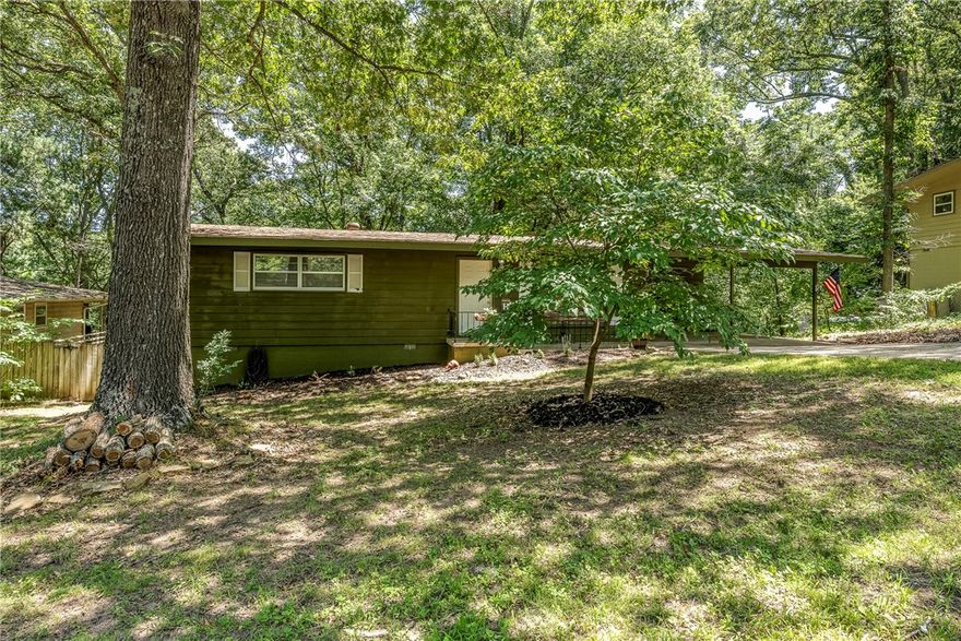 Ideal home for bike enthusiasts. Well manicured 2 bedroom 2 bath home surrounded by large trees and easy access to the trails. Minutes from Bella Vista Country Club and all amenities living in Bella Vista has to offer. Close to Hwy 71 but far enough away to avoid traffic noise, this gem is move in ready including a fence backyard for children and pets. Make an appointment today to see this charming home.