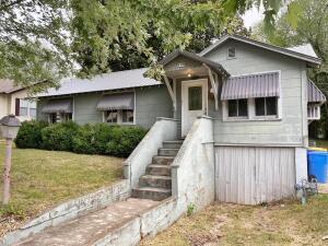 Looking for a fixer upper or a flip house? This 3 bedroom, 1 bath home, listed at just over $57 per square foot, could be your money maker. The home has a metal roof, hardwood floors, natural gas furnace, chain link fenced yard, and endless possibilities. Convenient location.