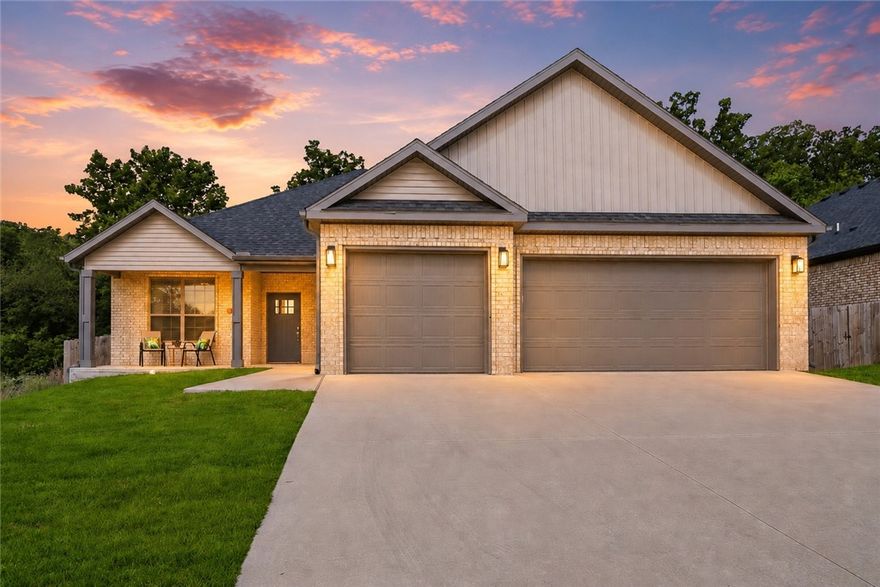 Beautifully maintained 2023-built home in desirable Brookside Estates! This 4-bedroom, 2-bath home offers 1,973 square feet of thoughtfully designed living space with a spacious open-concept layout perfect for everyday living and entertaining. The kitchen flows seamlessly into the living and dining areas, while the split-bedroom floor plan provides privacy for the primary suite. Enjoy outdoor living year-round on the covered back deck overlooking a private backyard. Complete with a 3-car garage and modern finishes throughout, this move-in ready Bentonville home combines comfort, functionality, and convenience.