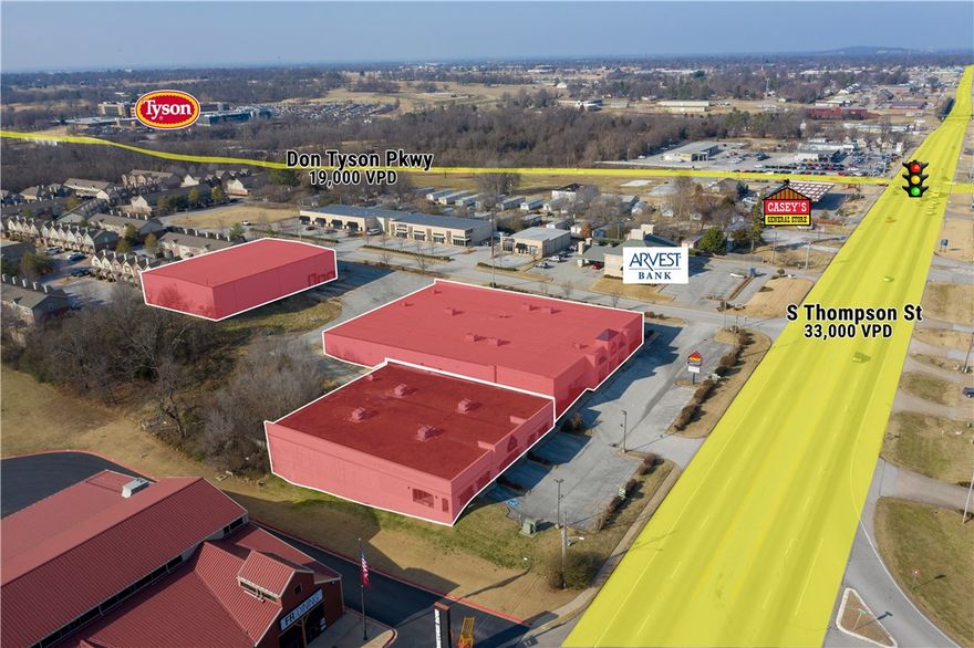 3 buildings for sale.  Approximately 325' of frontage on S Thompson St/Hwy 71-B.  All building sprinkled and include roll-up doors and high ceilings.  Warehouse industrial racks convey.  Close proximity to Tyson Headquarters.  Lot size is 3.78 Acres.