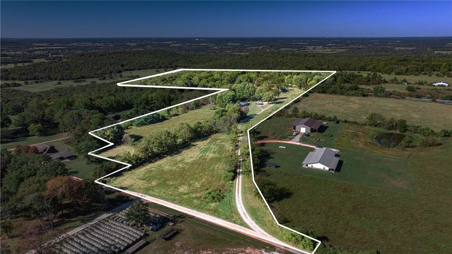 Discover a rare opportunity to own over 32 acres of prime land with a 3-bedroom, 2-bathroom home, just 30 minutes from I-49 in Fayetteville! Priced for the land alone, this fixer-upper home is a bonus, ready for your vision—whether it’s a full remodel or a cozy homestead. The expansive property features a 1500-foot well and an on-site generator, ensuring self-sufficiency and limitless potential.
The north 12-acre parcel offers an ideal site for building your dream home, with plenty of space for privacy and creativity. Four hen barn slabs remain, perfect for reimagining as storage, workshops, or unique outbuildings. Whether you’re looking for a homestead, hobby farm, or investment opportunity, this sprawling estate is a blank canvas awaiting your touch. Don’t miss out on this incredible value—schedule your visit today!
