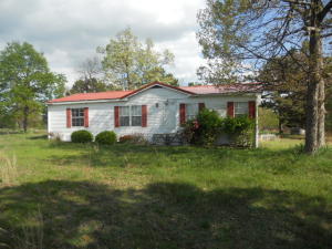 Property will be offered at AUCTION with reserve on May 7th at 11:00 AM. Terms will be 10% down day of sale and close within 30 days. Consist of a 1992 28x60 Doublewide, 1996 28x54 Double wide, 30x60 shop with CH&A, all on 7.5 acres on Orchard Point Road. Lot's of possibilities with this property.