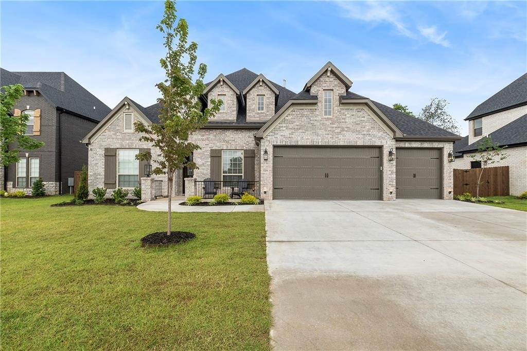 Modern 4 bed 4 bath home in desirable Roger’s Savannah Estates neighborhood. Spacious, open floor plan offers a large kitchen opening to breakfast nook and large family room with fireplace. Separate dining room and Primary suite on main level. Large Primary suite offers ensuite with double vanity, 2 large walk-in closets, whirlpool tub and separate shower. Downstairs offers two additional bedrooms with full baths and an office/additional bedroom. Upstairs is an oversized bonus room with a full bath. Entertain on the covered backyard oversized patio with fireplace and grill. 3 car garage. Privacy fence. Washer/Dryer, Refrigerator and lawn care are provided. Home is unfurnished with Immediate Availability. Apply at PrimeNWA.com