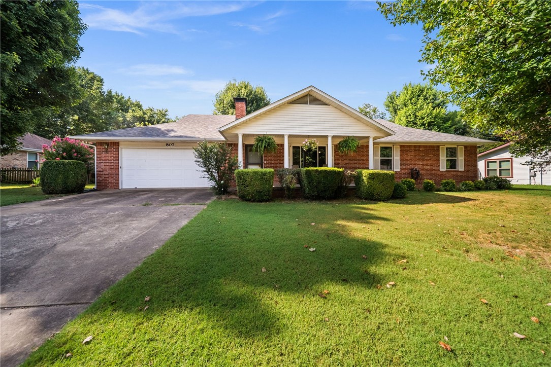 This checks all the boxes- and qualifies for $0 down Rural Development loan AND seller is offering buyer $5,000 towards closing costs! With unbelievable space, this all brick home has not one--but TWO-- huge living rooms! The front living room has a gas fireplace perfect for those chilly winter evenings. The back living room is surrounded by (updated!) windows overlooking the mature landscaping & beautiful blooming flowers. Need more space? This house has it-- a dedicated office space has a built-in cabinet and adjustable shelving. Need even more space? This house has that too-- a 24'x20' HEATED shop with garage door is at the back of the property.Perfect for the hobbyist- or a great potential for an ADU conversion! This well maintained home has newer vinyl windows throughout, new HVAC system in 2024, new roof & gutters in 2024,& updated hot water tank in 2024.The backyard oasis includes a covered patio area, updated privacy fence, professionally trimmed oak tree, & French drain system. Walking distance to schools!