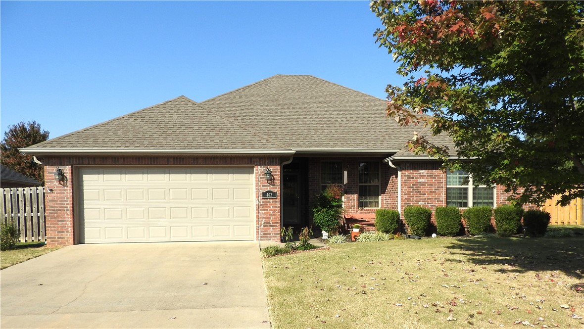 This beautiful well-maintained home is in the highly sought after Keystone Subdivision in Bentonville. The home has 4 bedrooms, 2 baths with 1777 square feet of living space. The home has a split floor plan with a spacious living room with a vaulted ceiling and a gas fireplace. The kitchen has granite countertops and a dishwasher that is only two years old. As soon as you walk into the home, you'll see just how well it has been taken care of! The Walmart Home office and the Bentonville Square are only minutes away. Trails are nearby and a playground is across the street. The home is wonderfully landscaped with an all-brick exterior and a new storage shed in the backyard. A tornado shelter is in the garage.