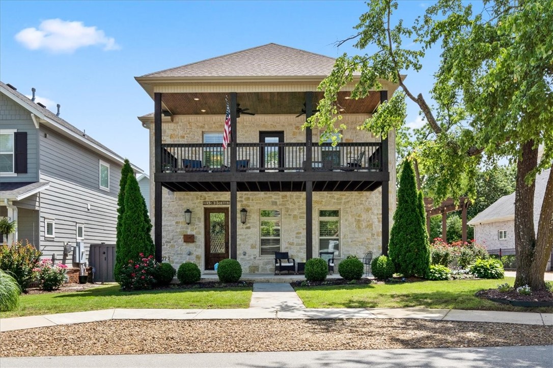 Welcome Home to Downtown Bentonville living at its finest! This immaculate home is on one of the most sought after blocks in downtown with a great community feel. You will love the interior and the outdoor living areas including a nice sized backyard with outdoor fireplace. The kitchen is oversized with a nice eat in dining area open to the living area with large kitchen island. Newly remodeled primary bath with high end finishes with an oversized shower and separate soaking tub. Oversized 2-car garage with a 3rd parking spot for apartment. The detached apartment would make a great revenue stream as an Air BNB or rental or just use for guests or mother in law suite. Two living areas in main home and a sunroom. Office &/or Bonus room could be 6th bedroom. Entertaining will be a delight in this fabulous home. Walk to the square and all the wonderful events Downtown Bentonville has to offer. Main House is 3264 ht.sq.ft. and guest apartment is 542 ht.sq.ft. for a total of 3807.