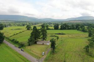Don't Miss THIS!! Have you been searching for the perfect Farm house? This ALLmost new farm house is situated on 2 acres of pasture land! This stylish home offers all the comforts of tradition including three bedrooms, two full bathrooms, Walk in tile shower, open spacious floor plan, custom kitchen plus surrounded by mountain views! Call today for your private tour!