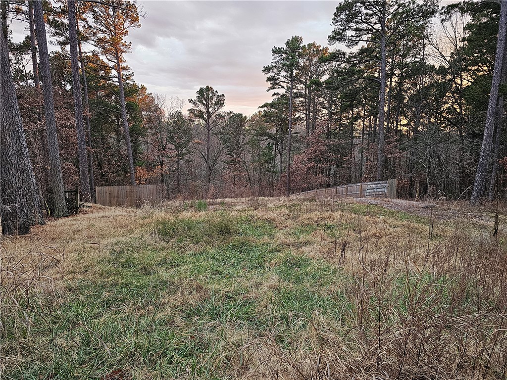 This great opportunity has an existing septic system. The lot is at an amazing location between Scottsdale Golf Course, Bella Vista Country Club. Very close to the tunnel vision, and technical difficulty Bike Trails.