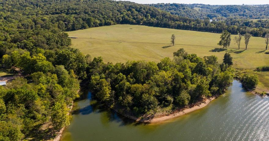 22 acres Table Rock Lakefront land with Approx. 800 ft of Walkdown, rural water and electric on site.
Property is a mix of improved pasture and approx. 5 ac of wooded property.  
Easy access from Hwy 311 N.  Ideal Horse Farm or small ranch on the Lake.
Boat Lunch a few hundred feet away from the property. 
Wonderful Lake view and Lakefront building sites. Location is on the quiet part of Table Rock Lake for swimming, kayaking and water skiing.  The confluence of two tributaries into the main lake channel at this location make the fishing excellent.  
 Property is Centrally located to Branson MO, Harrison AR and Bentonville AR.  Less than 20 miles to Top of The Rock Golf course, Long Creek Marina and Big Cedar Lodge Entertainment Venue. 
More Land and home is available.
