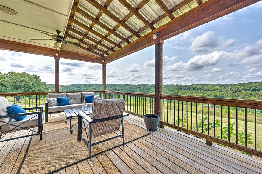 WELCOME TO ONE OF BENTON COUNTY’S BEST KEPT SECRETS!!  Nestled atop a picturesque hill and spread across 10 lush acres, this exquisite property offers unparalleled tranquility and BREATHTAKING views!  This custom residence offers a rustic elegance w/ sophisticated luxury and enjoys panoramic views from almost every room starting with the spacious great room boasting soaring 26-foot ceilings & expansive windows that offer uninterrupted, wide-open views of the magnificent surrounding landscape.  Fabulous chef’s kitchen w/ converted antique cast iron stove, sprawling 10’ x 4’ island, double ovens and 2 pantries! Private master retreat w/ sitting room, vaulted ceilings & private deck with stunning views! Amazing oversized laundry/mudroom, 2nd master on 2nd floor, 5th bedroom w/ private entrance, upstairs living area w/ vaulted ceilings, 3 car garage plus tuck under 4th garage stall, and EXPANSIVE DECKS w/ outdoor fire pit & hot tub offering the ultimate outdoor living space with one of the best views in town!