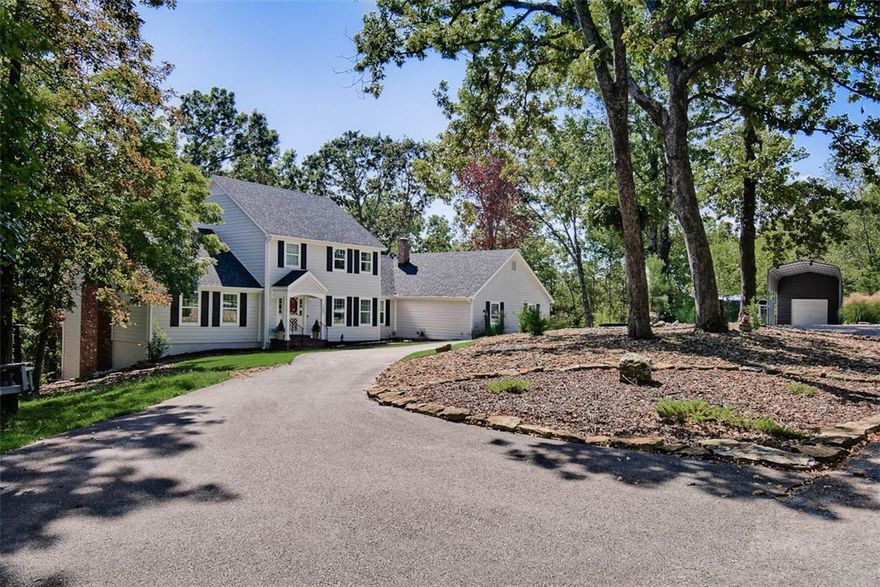 Fantastic opportunity in Hyland Park! This turn-key, three-level home offers a rare combination of space, privacy, & convenience on 2.30 acres at the end of a private cul-de-sac. You're just minutes from Lake Atalanta, downtown Rogers, &  Prairie Creek.  Enjoy immediate access to recreation via the Lake Atalanta Loop, Pleasant Ridge Trails, & Railyard Loop that connects to the Razorback Greenway Trail. The property includes an RV pad, storage build, carport w/extra covered parking & garage. The property is essentially new inside & out, featuring an extensive list of recent updates: James Hardie Siding, roof, windows, exterior doors, & leaf-guard gutters. Heating, A/C, water heater, whole-home water filter, & a whole-home generator hookup. Fresh paint, new carpet, countertops, faucets & a modernized kitchen w/new appliances. This home provides excellent indoor and outdoor entertaining spaces, it has an updated yard and new covered grilling area, TV space, and the hot tub stays. This is a must-see move-in ready home!