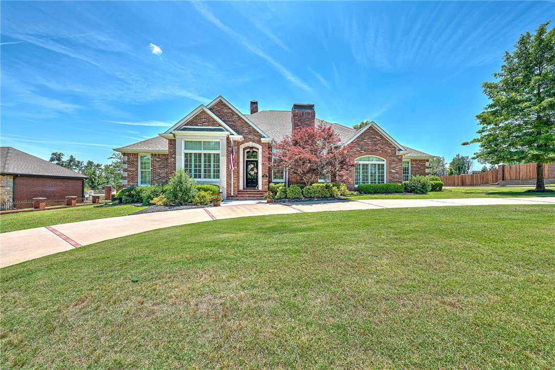 TUCKED AWAY ON OVER HALF AN ACRE IN ONE OF BENTONVILLE’S MOST SOUGHT AFTER SUBDIVISIONS, HANOVER, this STUNNING ONE LEVEL HOME is an absolute GEM!! Gorgeous curb appeal w/ side load 3 car garage, spacious front circle drive, private inground pool and a FULLY REMODELED interior that will WOW you! This PICTURE PERFECT beauty offers newly painted woodwork, trim, built-ins/cabinetry throughout with plantation shutters and new Anderson Renewal windows! Beautiful eat-in chef’s kitchen w/ double ovens, gas cooktop, large island and pantry! Two inviting living spaces make entertaining a breeze, with the main living area featuring a cozy fireplace and custom built-ins. Host memorable gatherings in the spacious formal dining room, complete with its own charming fireplace! Large sunroom/office walks out to the spacious patio and pool…with tons of green space and new fence! Huge master retreat w/ luxurious en suite bath, 3 guest bedrooms, 2 full baths and a half bath…all newly remodeled! AMAZING location close to everything!
