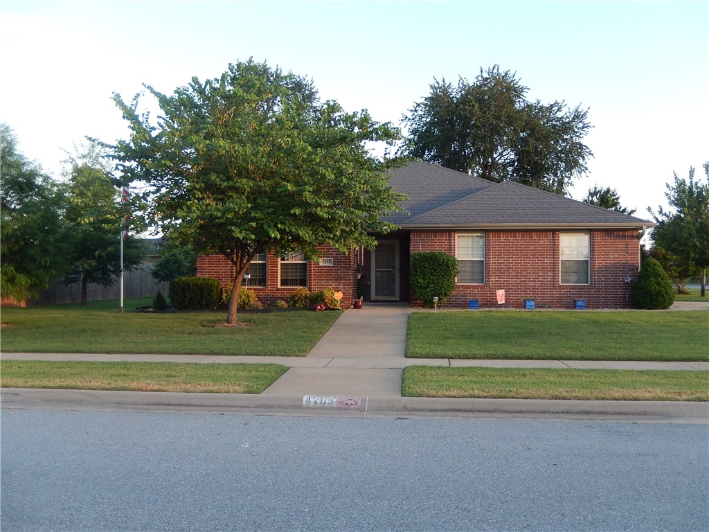 Beautiful one owner, 3 bedroom 2 bath brick home. Spacious living room with cozy fireplace, nice eat-in kitchen with gas range, washer and dryer, refrigerator to remain. Master bedroom suite has whirlpool tub, his and her closets, and separate shower. 2 car garage, patio and huge yard.
