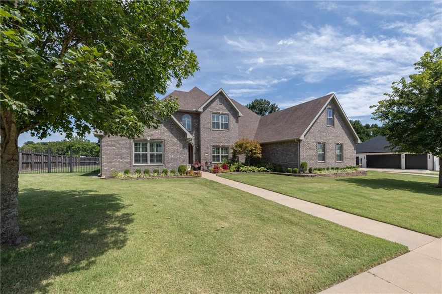 Beautiful home in The Enclave featuring a charming brick entry and numerous upgrades! Enjoy the elegance of new hardwood floors and fresh paint, with the second level scheduled for a paint refresh. The layout includes a formal dining room, formal living room, & a hearth room/second living room off the kitchen, complete with a cozy fireplace and built-ins. Kitchen boasts an eat-in dining area, large bar, & stainless steel appliances. Plantation shutters throughout add a touch of sophistication. The primary suite offers a jetted tub, walk-in shower, and walk-in closet. Upstairs, you'll find 2 bedrooms and a bonus room, with the primary and an additional bedroom on the main level. Property also includes a detached 400 sq ft man cave with cedar-lined walls, ceiling, and new HVAC, which could potentially be converted into a mother-in-law suite or guest apartment, with the option to add a bathroom and kitchenette. Enjoy outdoor living in the private backyard with 2 back patios, a fire pit, irrigation, & room for a pool!