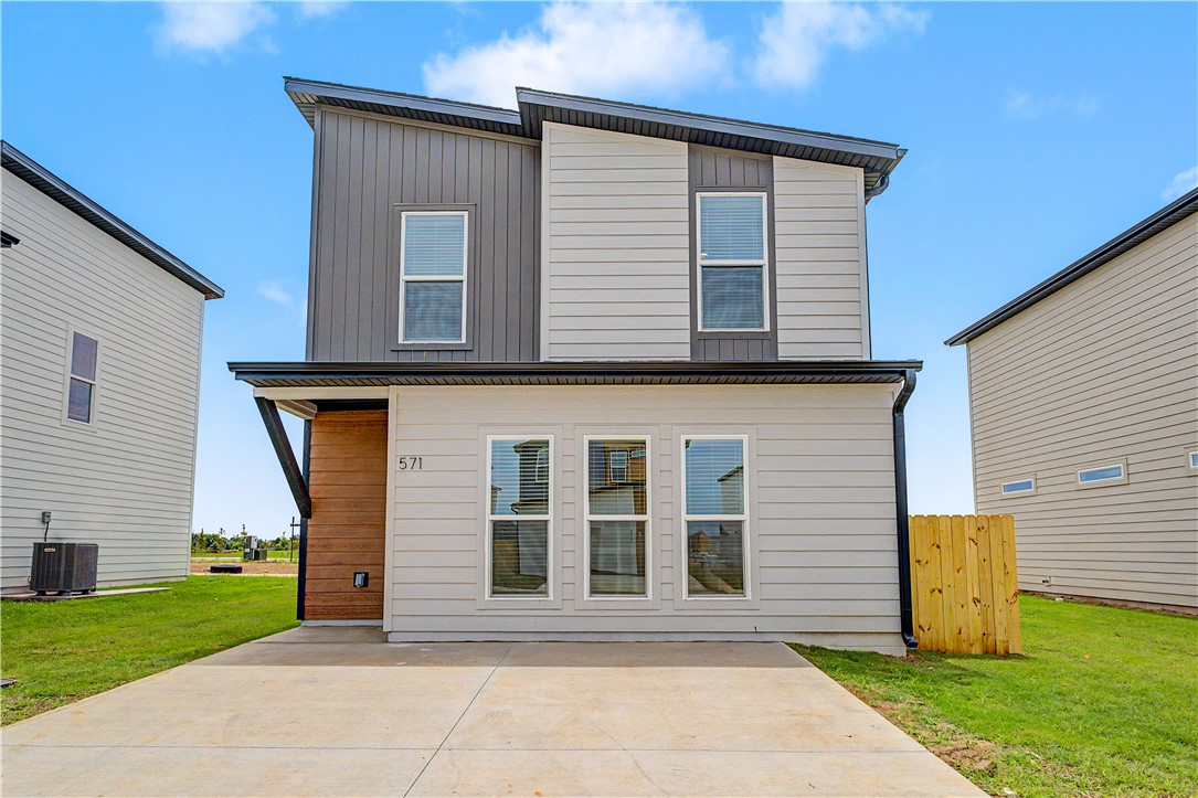 The property features a contemporary design, black