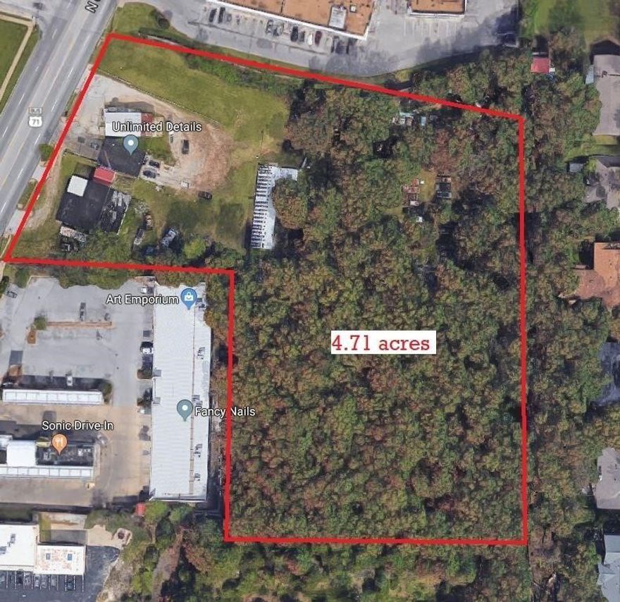 Large lot on N college (71B) with endless potential. 3 buildings on site. All utilities available. 30,000 cars pass by this location on a daily average.