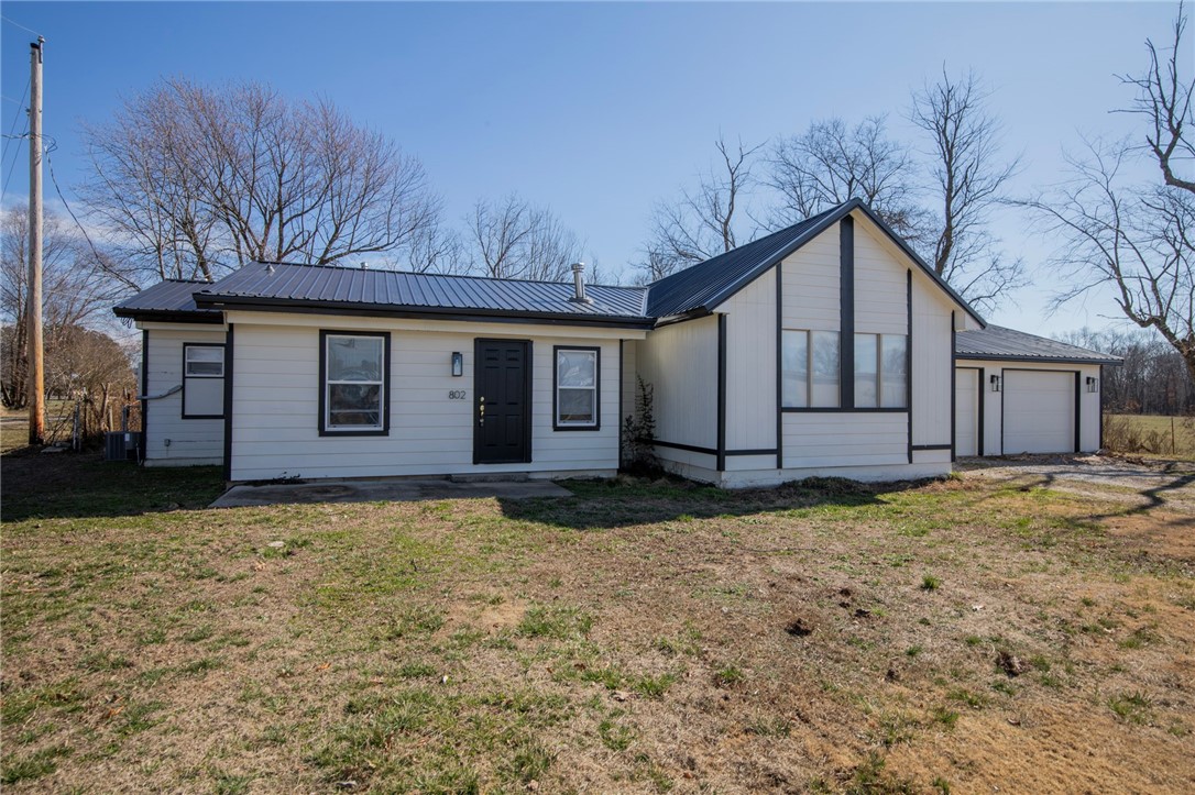 Newly remodeled home in Gravette. 3 bedroom 2 bath. Large open floor plan. Wood style flooring throughout. Large kitchen with island, butcher block counters and stainless appliances. Master has great tile shower. Large Fenced yard and covered patio, also attached deck.