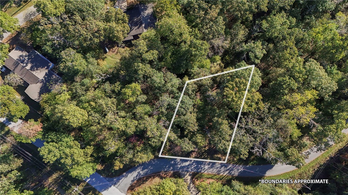 Great location just a block away from Lake Ann and close to the trails. Nice lot for a walkout basement and only 15 minutes to Bentonville.