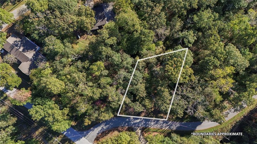 Great location just a block away from Lake Ann and close to the trails.  Nice lot for a walkout basement and only 15 minutes to Bentonville.