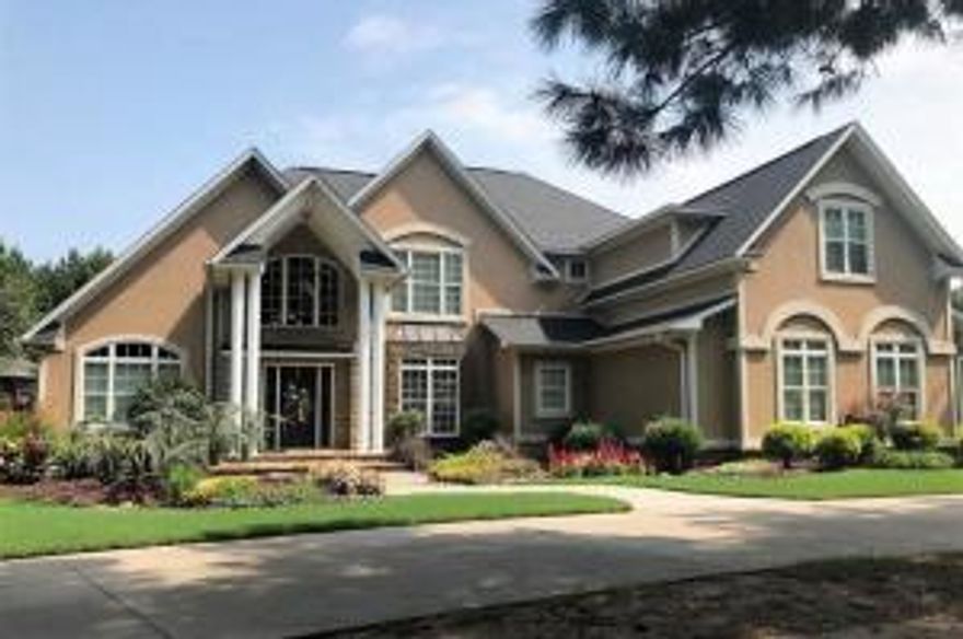 When you arrive at the front gate and drive down the tree lined driveway, you will recognize  the true craftsmanship, class, and style of this beautiful home sitting on 7.5 private manicured acres. The main house boast 5 bedrooms, living area with tall ceilings and open balcony, large den with fireplace and cedar ceilings, theater room,  and a custom kitchen a master chef would love. The resort-like pool area is a true oasis with a huge water slide and custom rock features. Perfect for entertaining guest with large open space as well as covered outdoor spaces. The detached guest house with kitchenette and bath can also serve as the ultimate man-cave and office area. A 30x40 metal shop is located at the back of the property and offers additional work space and storage.One year home warranty