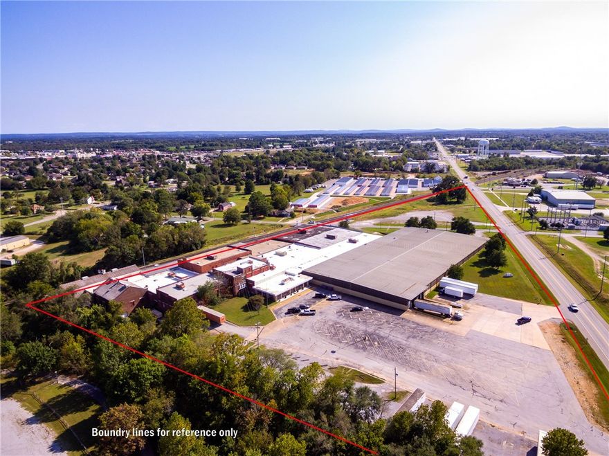 Located in the heart of Siloam Springs, this facility is suitable for many uses. Road and rail frontage. The building has been added on through the years and has been used as an operating business for it's entirety.