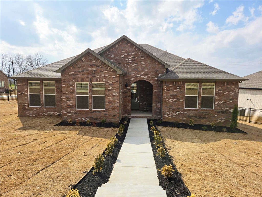 Beautiful 2059 Plan with 2115 sq feet in Riverwalk, one of Fayetteville's most unique subdivisions that was designed for perfection. It is located in East Fayetteville, just 10 minutes from the Fayetteville Square, filled with downtown entertainment and a variety of restaurants. Welcome to Phase V Riverwalk, centrally located to all that Northwest Arkansas has to offer. This brand-new home will have LVP throughout. Kitchen will have 42-inch cabinets, stainless steel appliances, and quartz countertops! Living room will have a beautiful gas log fireplace with painted brick surrounds and white mantle. Cased windows in the living, dining, and bedroom one. The bedroom one will have dual sinks and quartz countertops, oversized walk-in shower. High-efficiency air conditioning system with programmable Wi-Fi thermostat. Exterior of homes will be brick or Brick/ LP Smart Siding per plan. Taxes and Parcel TBD.