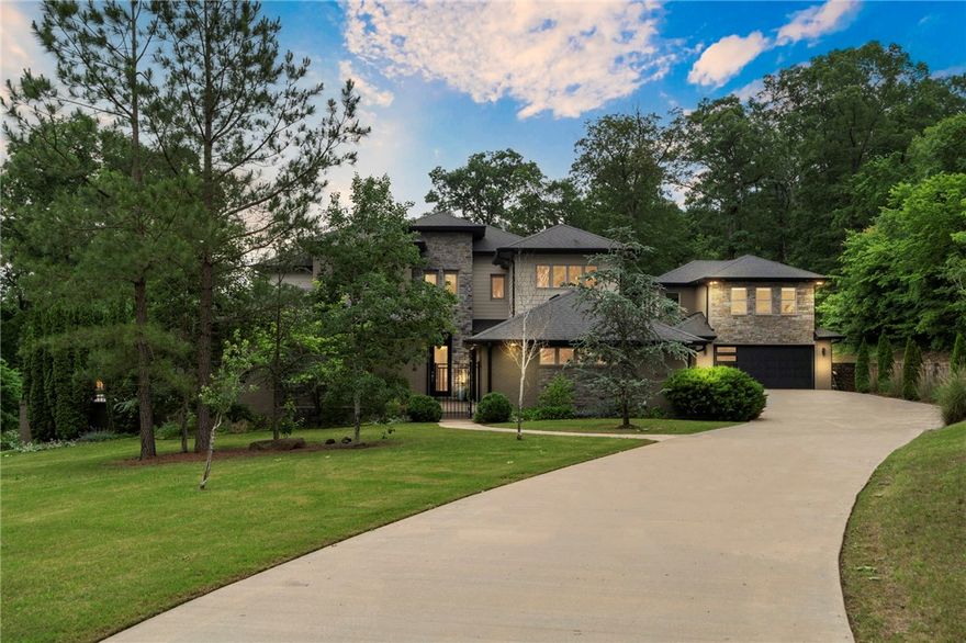 Luxury Living Estate in Springdale, designed for those who value space, privacy, nature, style and luxe amenities. This expansive property offers a flexible layout ideal for families, entrepreneurs, creatives, or anyone seeking both luxury and utility. A detached 810 sq ft creative studio above the garage offers full independence—ideal for extended stays, creative projects, or executive use. The main living area features soaring ceilings and an open flow, perfect for hosting or relaxing in style. A professional-grade kitchen with premium appliances and a 6-burner gas range is built to support both daily life and large-scale entertaining. Natural light fills the home w/large windows throughout. The primary suite includes a spa-style bath, dual vanities, soaking tub, and walk-in shower, creating a private retreat within the home. Outdoors, the property is built to impress—with a full outdoor kitchen, heated pool, covered cabana and 5-car garage. This property has been pre-appraised.