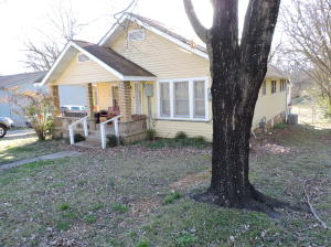 Great home or rental! Nicely remodeled with new interior paint, new laminate and tile flooring, new a/c unit, hot water heater and electric panel. New 1/ 2 bath and remodeled kitchen. 2 bedrooms, 1 1/2 bath, covered back porch, vinyl siding exterior. Large utility room, fenced yard and near hospital Harrison square. Large storage area under the house.