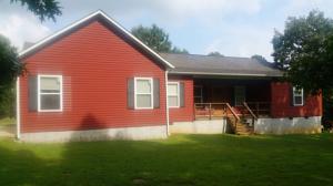 Nice open floor plan home; hardwood floors, study/office that could be used as a 4th BR; end of road; private park-like setting; large master bath with jetted & slate floors; fenced garden spot; has RV hook-up; only 20 minutes out.