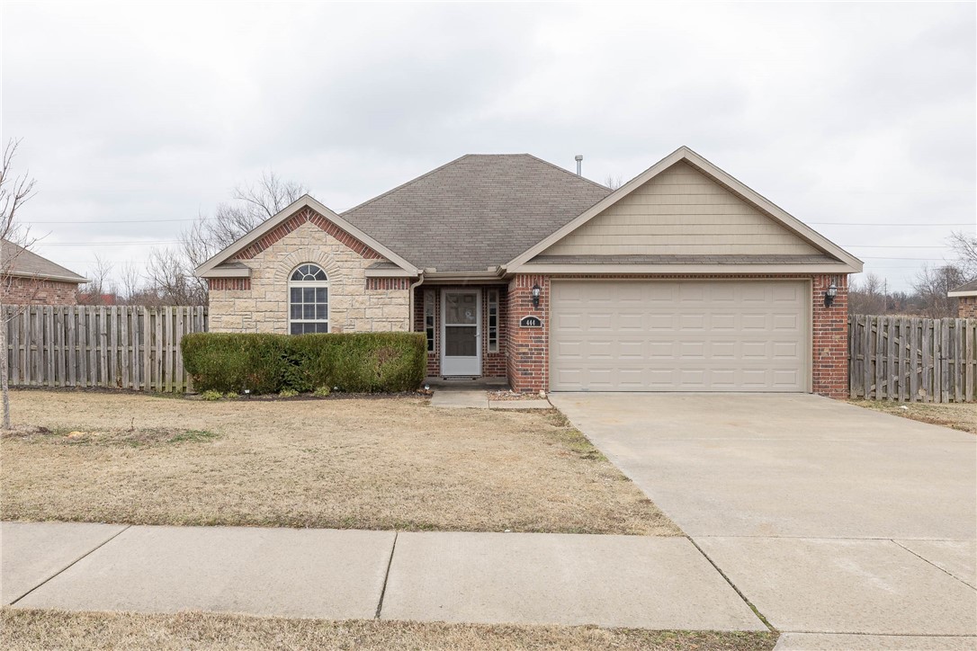 Adorable move in ready rental home in central location off of Elm Springs Rd. 3 bedrooms, 2 full bathrooms, nice sized living room with corner gas log fireplace, kitchen and separate laundry. Kitchen has granite countertops, stainless steel electric range, microwave, and dishwasher. New LVP floors throughout, no carpet. 2 car garage. Fully fenced backyard.