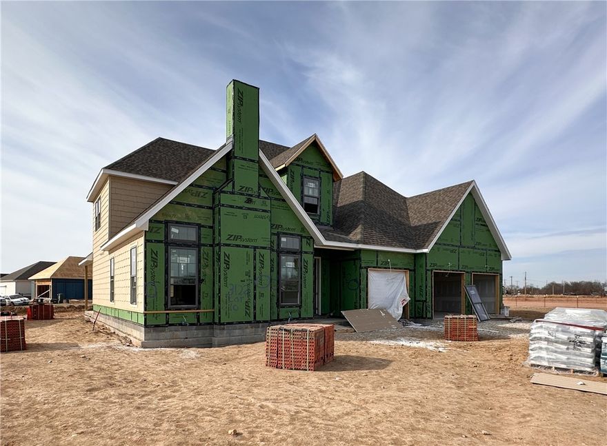 Welcome to County Line Square, a new Springdale community near Shaw Family Park with a pool and pavilion. Upon entry, the living room sits just to the left and features a vaulted ceiling, a brick fireplace, and engineered hardwood floors that extend throughout the first floor. This space opens into the dining and kitchen area, where sliding glass doors lead to the covered back patio. The kitchen includes a large island, quartz countertops, cabinets to the ceiling, GE Profile stainless steel appliances, and a pantry. Down the hallway, you’ll find access to the 3-car garage, the laundry room, a guest bedroom, a full bathroom. The primary suite is also on the main level and features a vaulted ceiling, along with a bathroom that includes a double vanity and centered makeup vanity, a walk-in shower, and a walk-in closet. Upstairs offers 3 additional bedrooms and a full bathroom. A fence, blinds, and gutters are included. Builder’s preferred lender is offering $3500 toward closing costs or a rate buy down. *Agent Owned*