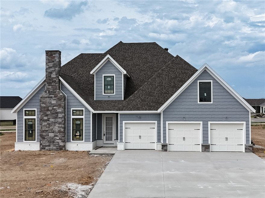 Welcome to County Line Square, a new Springdale community near Shaw Family Park with a pool and pavilion. Upon entry to the Glenwood, the living room sits just to the left and features a vaulted ceiling, a brick fireplace, and engineered hardwood floors that extend throughout the first floor. This space opens into the dining and kitchen area, where sliding glass doors lead to the covered back patio. The kitchen includes a large island, cabinets to the ceiling, GE Profile stainless steel appliances, and a pantry. Down the hallway, you’ll find access to the 3-car garage, the laundry room, a guest bedroom, a full bathroom. The primary suite is also on the main level and features a vaulted ceiling, along with a bathroom that includes a double vanity and centered makeup vanity, a walk-in shower, and a walk-in closet. Upstairs offers 3 additional bedrooms and a full bathroom. A fence, blinds, and gutters are included. Builder’s preferred lender is offering $3500 toward closing costs or a rate buy down. *Agent Owned*