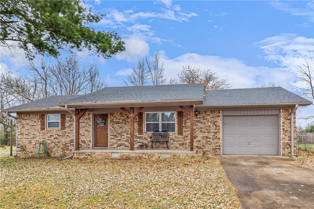 This delightful well-kept home was completely remodeled in 2018 with all new sheetrock, paint, wood laminate, & ceramic floors throughout, new vinyl windows, light fixtures throughout and so much more. Kitchen updated with shaker cabinets, granite counters, subway tile backsplash, & stainless appliances. Master suite has his & her closets. Large laundry room w/utility sink. Nice tile work in baths. Tankless hot water system. New electrical, plumbing & HVAC all updated in 2018. Located in charming Siloam Springs and close to everything you are looking for including shopping, dining, schools, trails, parks, and so much more! Come check out this home and make it YOUR new home!
