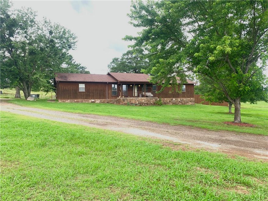 Enjoy country living at its finest! Only a short drive into town. This beautiful home is a must see! The 3 bed 2 bath home has the luxuries you're looking for. It has an in-ground pool for relaxing, surrounded by a wood privacy fence. Two shops with electric and one with water perfect for any hobbyist or even a business. The 10-acre property is fenced with a big, beautiful pond. Schedule your showing today!